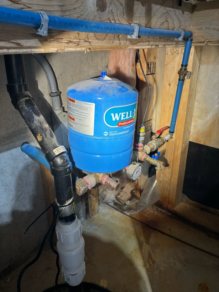 Well pump pressure tank and water system in Grimsby home